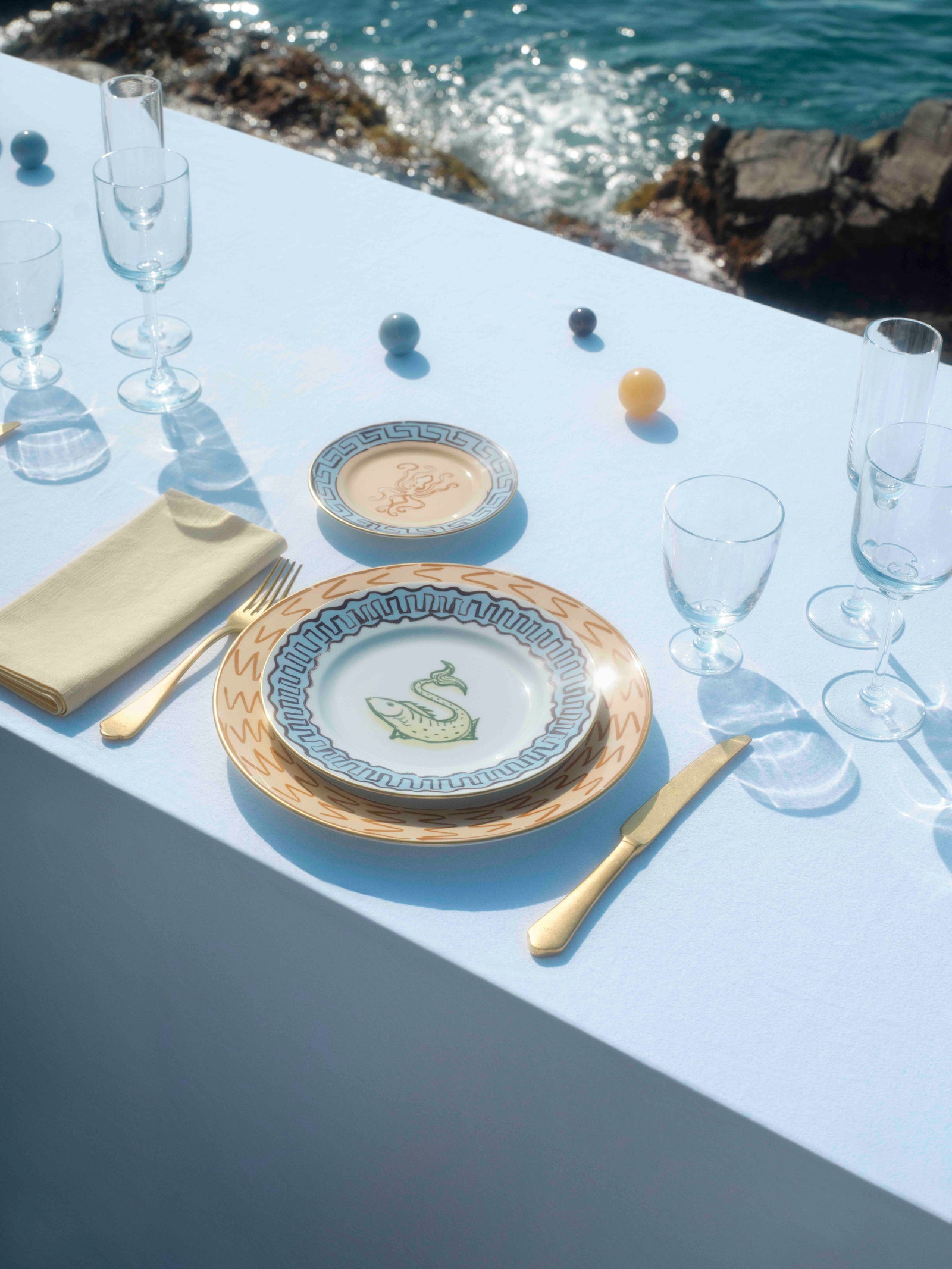 Images may contain furniture dining table dining table table blade tool plate dining table cup and outdoor